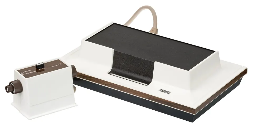 The original Magnavox Odyssey console with controllers and accessories.