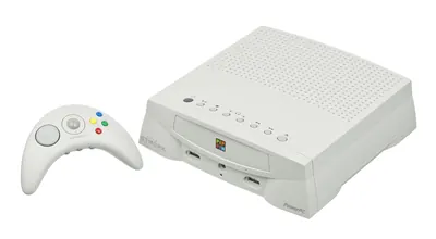 The Bandai Atmark version of the Apple Pippin with its wireless controller.